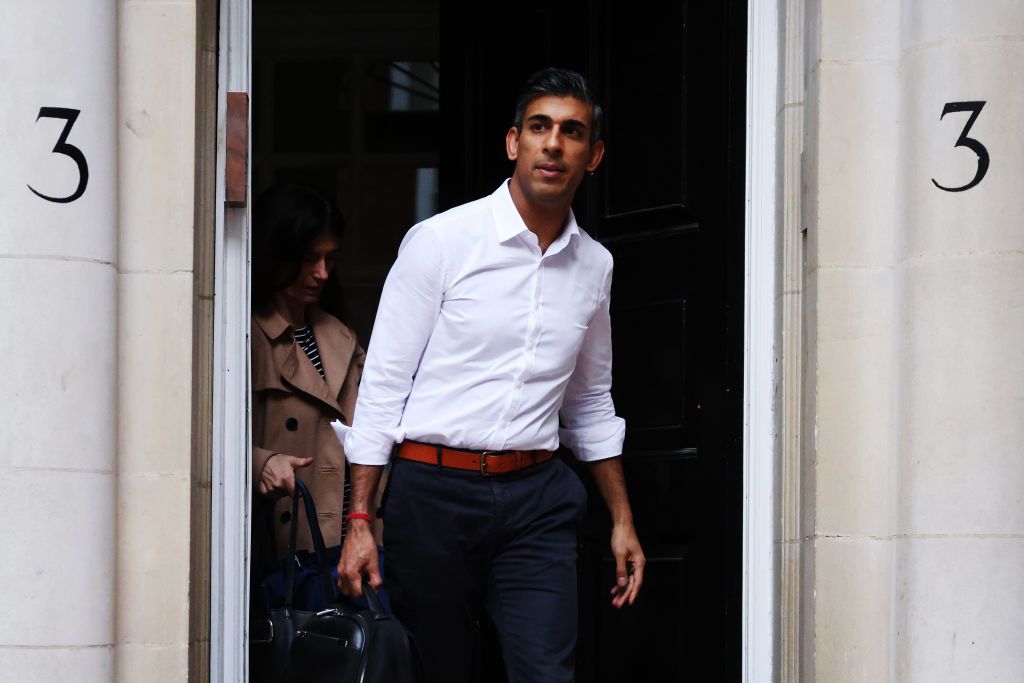 Rishi Sunak leaving building