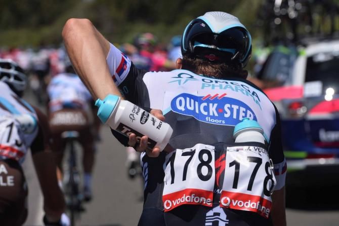 Martin Velits (Omega Pharma-Quick Step) on bidon duty