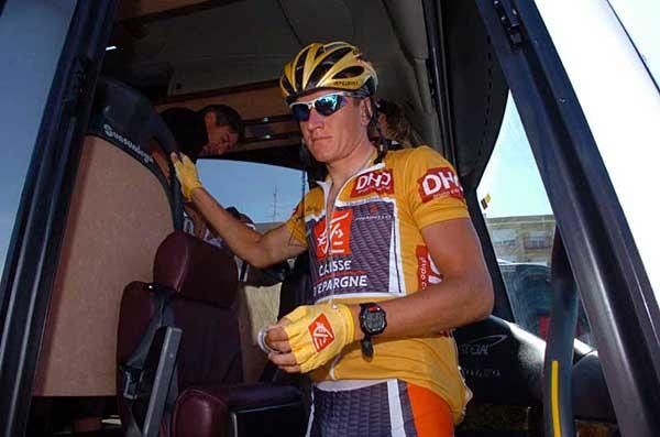 Race leader Efimkin leaves the Caisse d'Epargne team bus before the race.