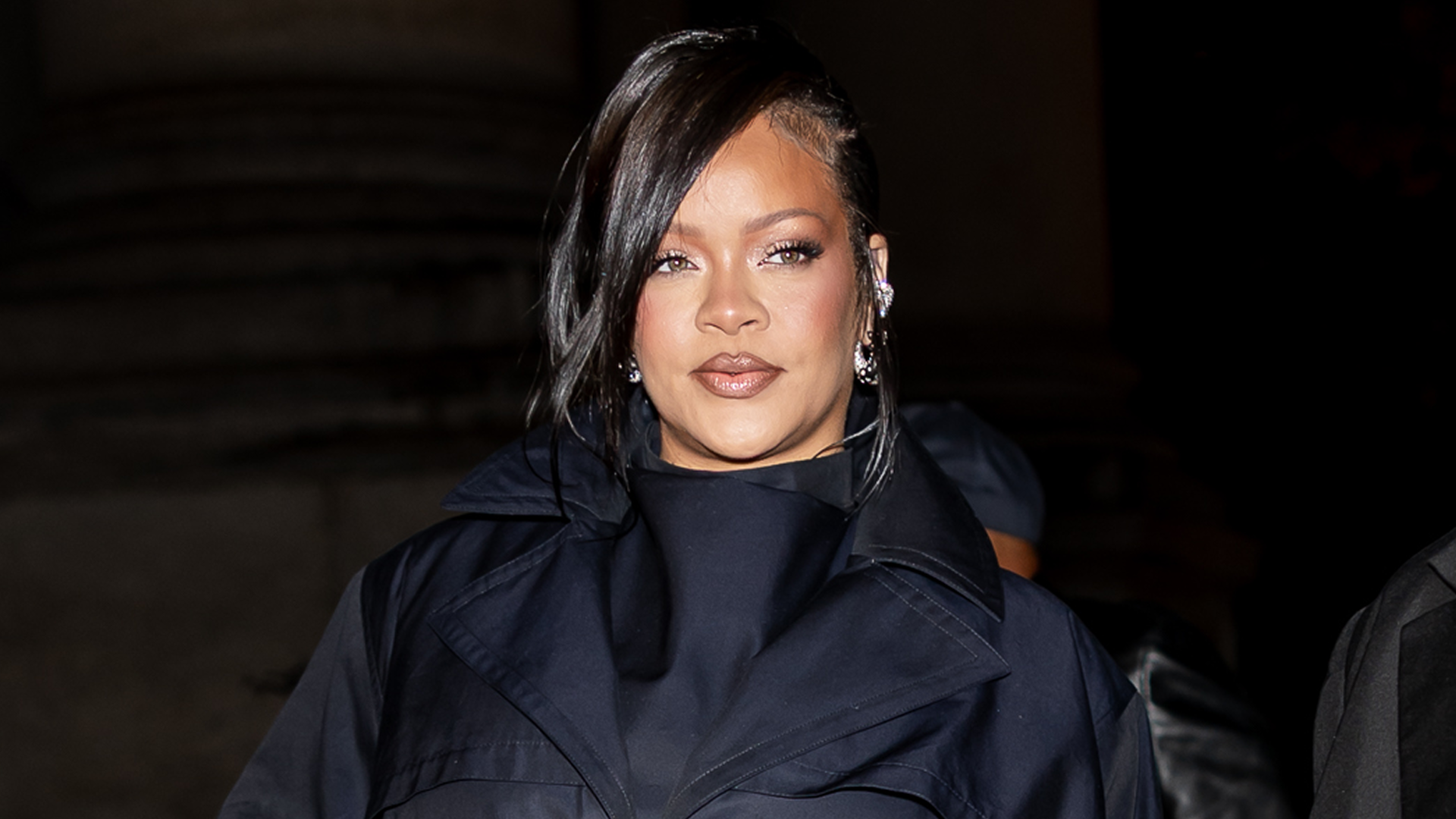 Rihanna was spotted in baggy jeans, rare sneakers, and a shawl, creating her latest high-low look