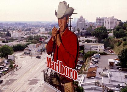 1995 A billboard for Marlboro Cigarettes with the iconic Marlboro Man on Sunset Boulevard circa 1995 in Los Angeles California The Marlboro Man was portrayed by Robert u201cBobu201d Norris Photo by Bill NationSygma via Getty Images