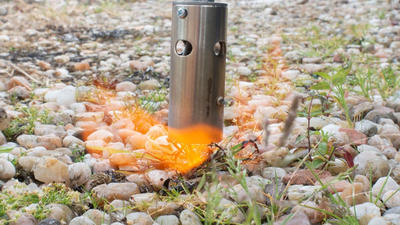 Weeding gravel using a flame weeder