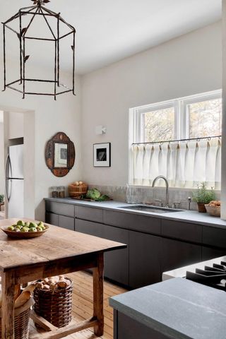 Rustic grey kitchen with zellige splashback tiles