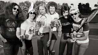 Kansas horsing around on a tennis court in 1976
