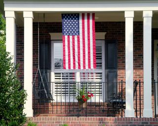 American flag hung outside house