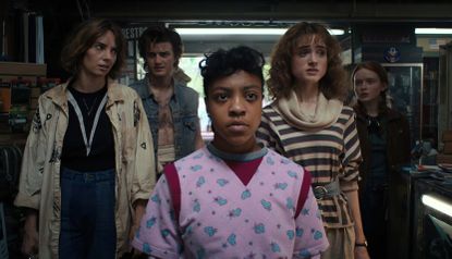 Maya Hawke as Robin Buckley, Joe Keery as Steve Harrington, Priah Ferguson as Erica Sinclair, Natalia Dyer as Nancy Wheeler, and Sadie Sink as Max Mayfield in STRANGER THINGS. When does Stranger Things season 4 volume 2 come out?