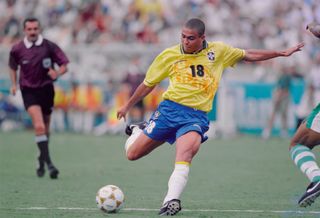 Ronaldo #18, Striker for Brazil takes a shot during the Men's Olympic Football Tournament Semi-Final match against Nigeria at the XXVI Summer Olympic Games on 31st July 1996 at the Sanford Stadium in Athens, Georgia, United States. Nigeria won the game 4 - 3 after sudden death extra time.