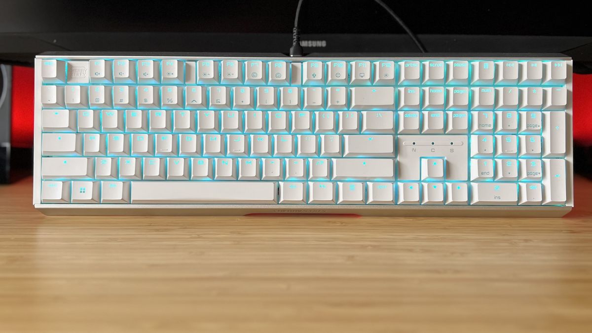 Cherry MX 3.1 gaming keyboard on a wooden desk