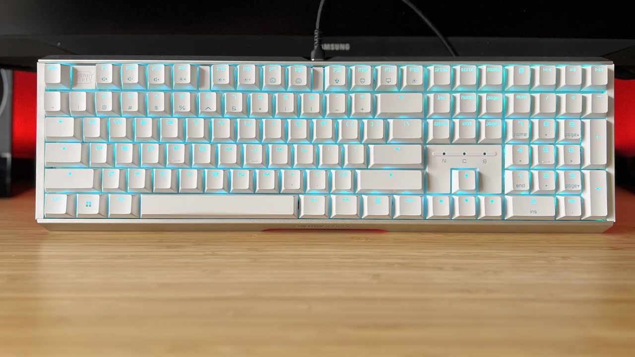 Cherry MX 3.1 gaming keyboard on a wooden desk