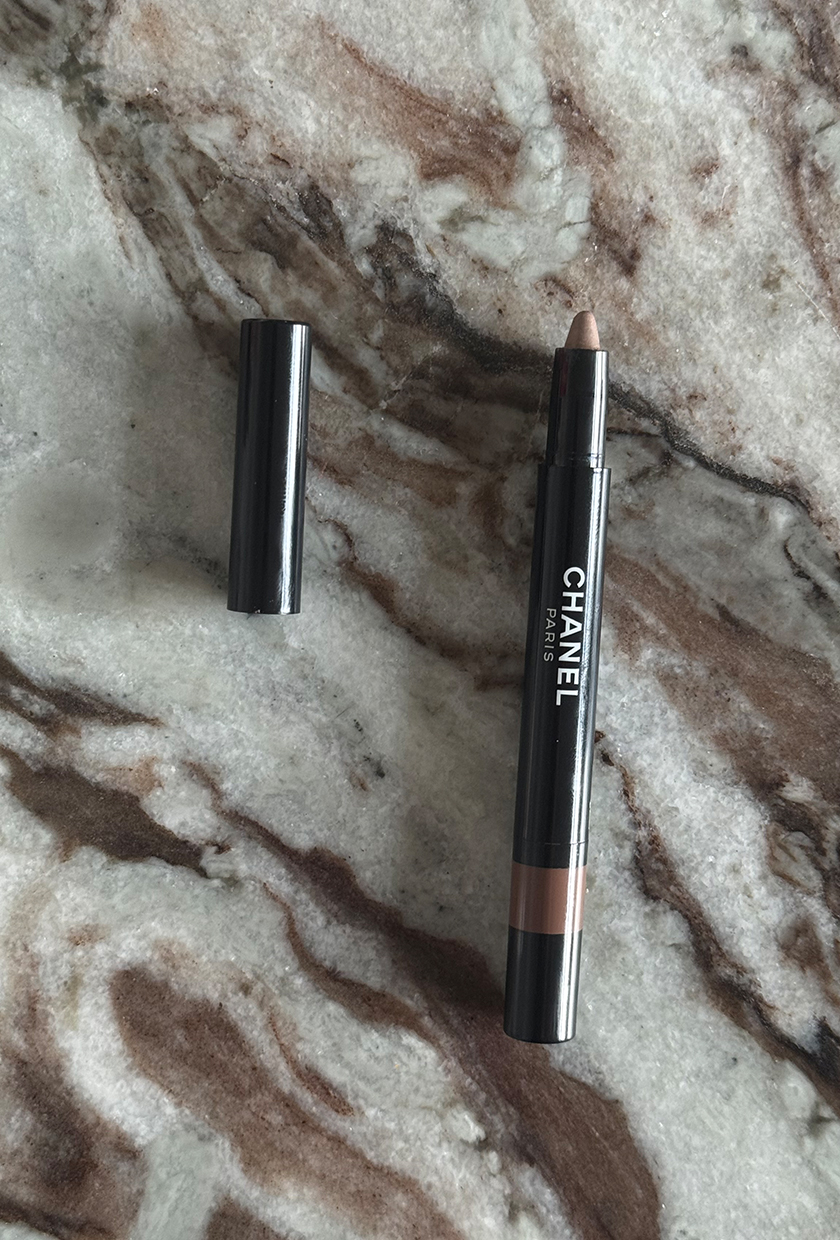 Chanel le stylo stick on a marbled stone table