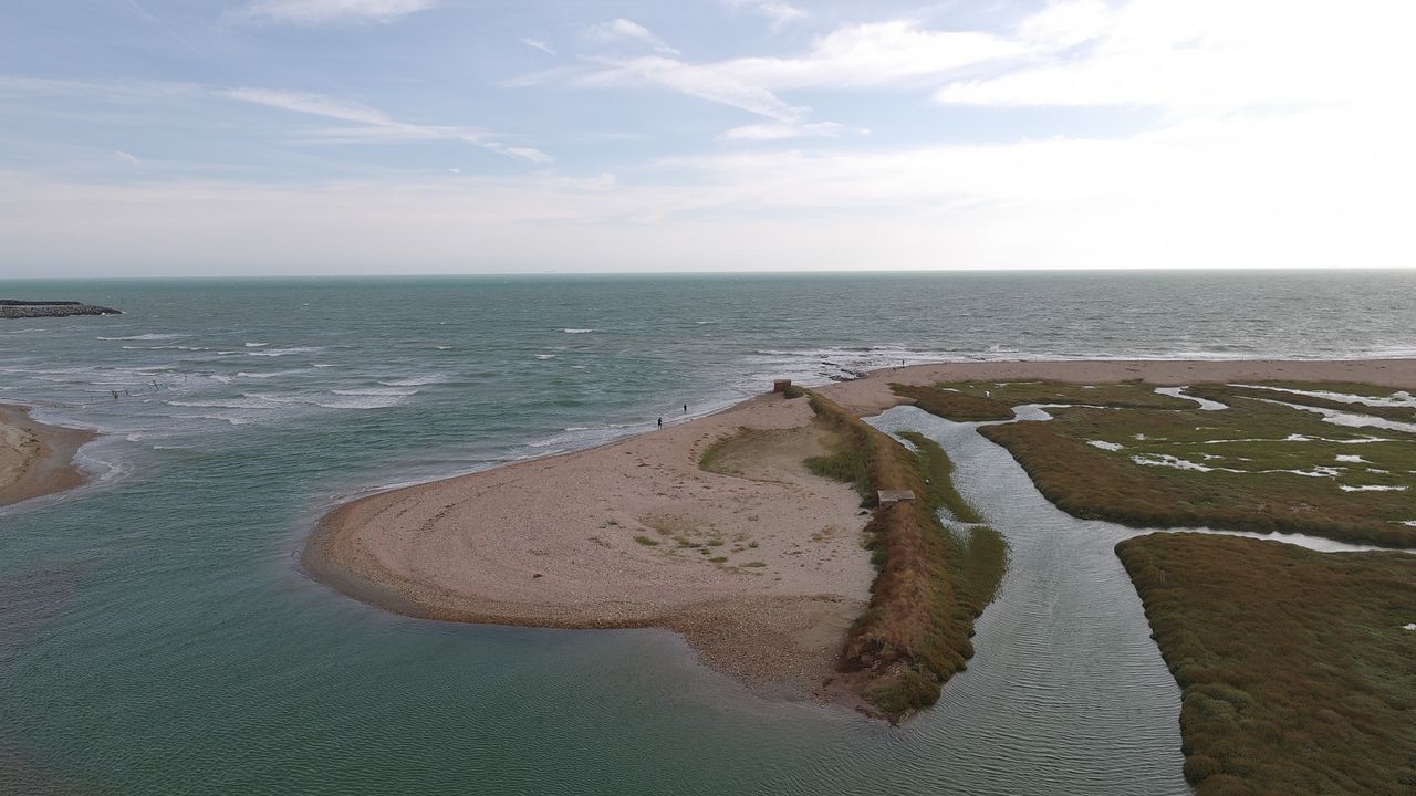 Aerial views of the South Coast of the UK on a cloudy day from a drone