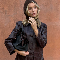 Elsa Hosk wearing brown croc-effect jacket, a top spring 2026 jacket trend.