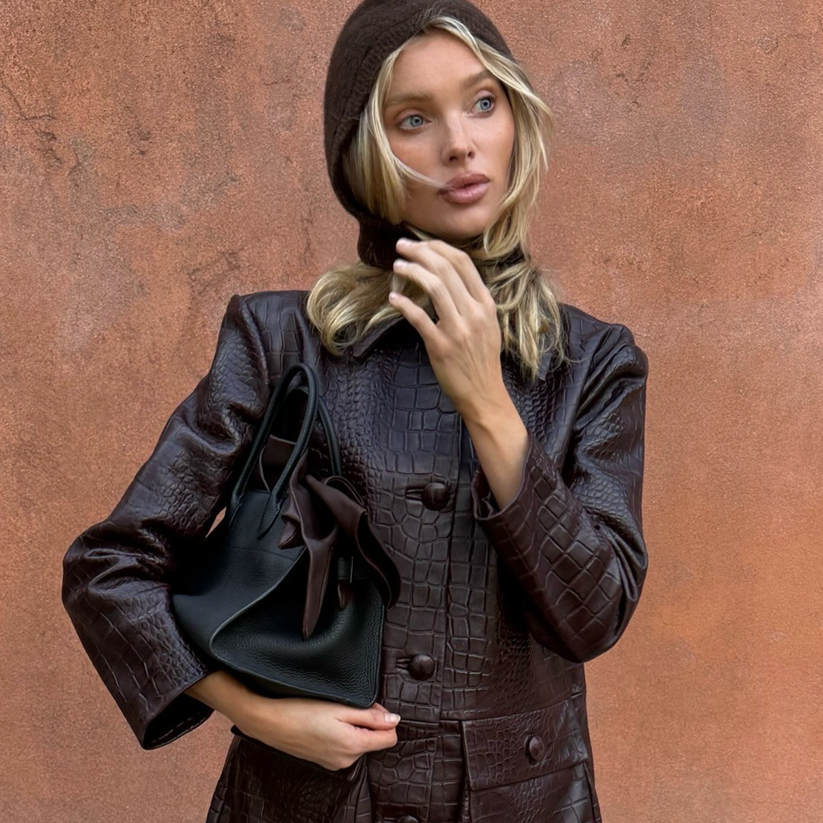 Elsa Hosk wearing brown croc-effect jacket, a top spring 2026 jacket trend.