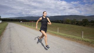 Reebok Boston Track Club runner Amy-Eloise Markovc running in the countryside