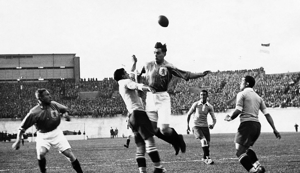 Photo from the 1928 Olympic Games shows the soccer game between Holland and Uruguay just at the moment of the game before the goal of Uruguay. (Photo by George Rinhart/Corbis via Getty Images)