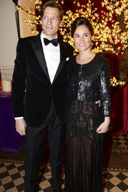 Pippa Middleton in a sheer black dress and boyfriend Nico Jackson at the Sugarplum Ball