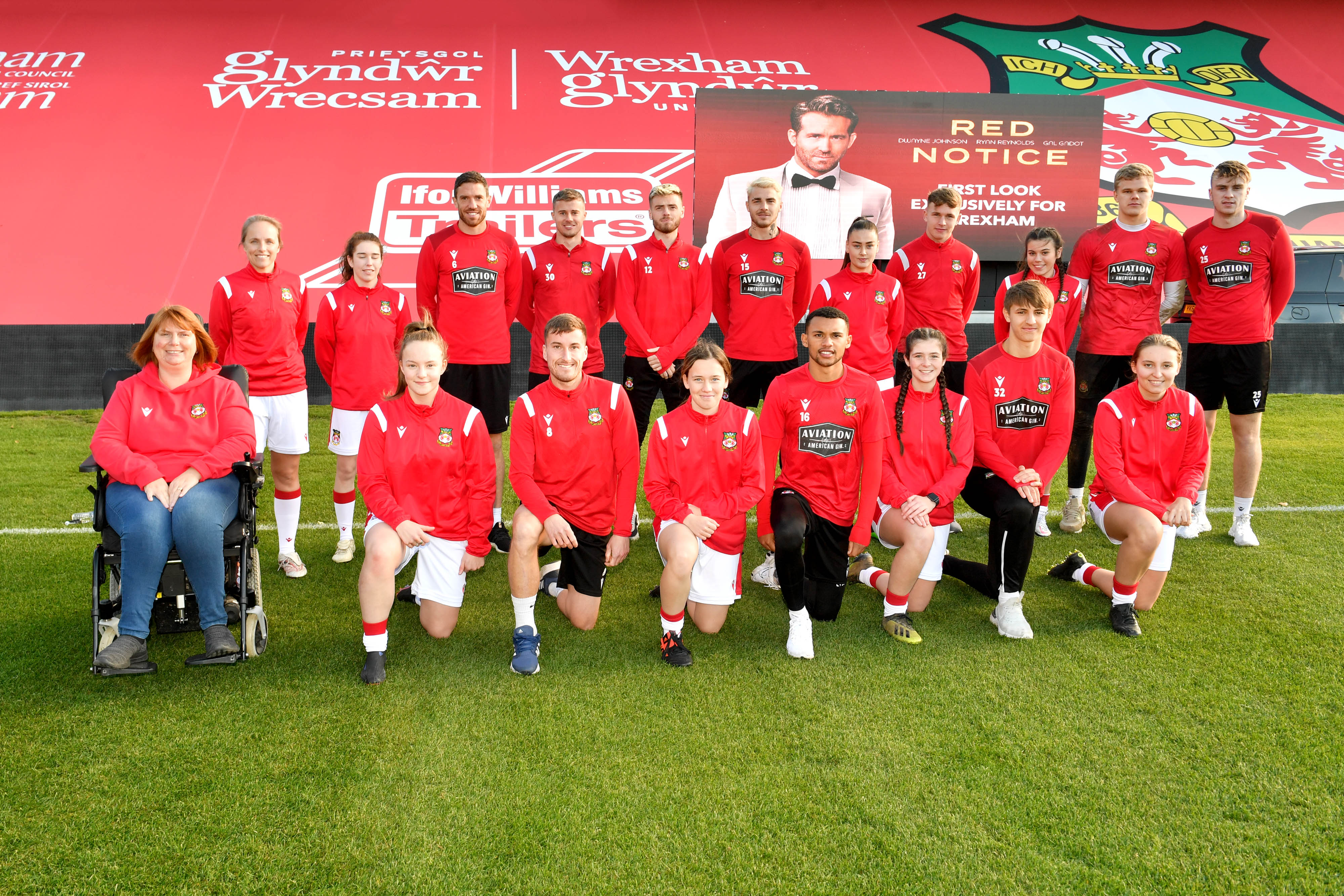 Ryan Reynolds promoting Red Notice at Wrexham's football ground.