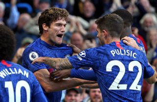 Marcos Alonso celebrates his winner with Christian Pulisic