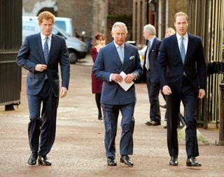 Prince Harry, Prince Charles, Prince of Wales and Prince William, Duke of Cambridge arrive at the Illegal Wildlife Trade Conference at Lancaster House