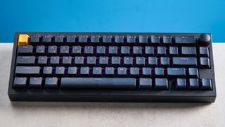 Lemokey P2 HE on a stone surface with a blue background