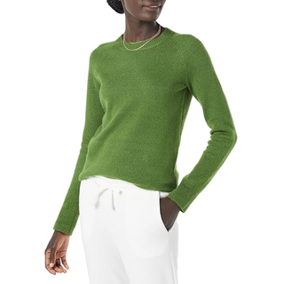 amazon prime fashion deals: woman wearing green jumper