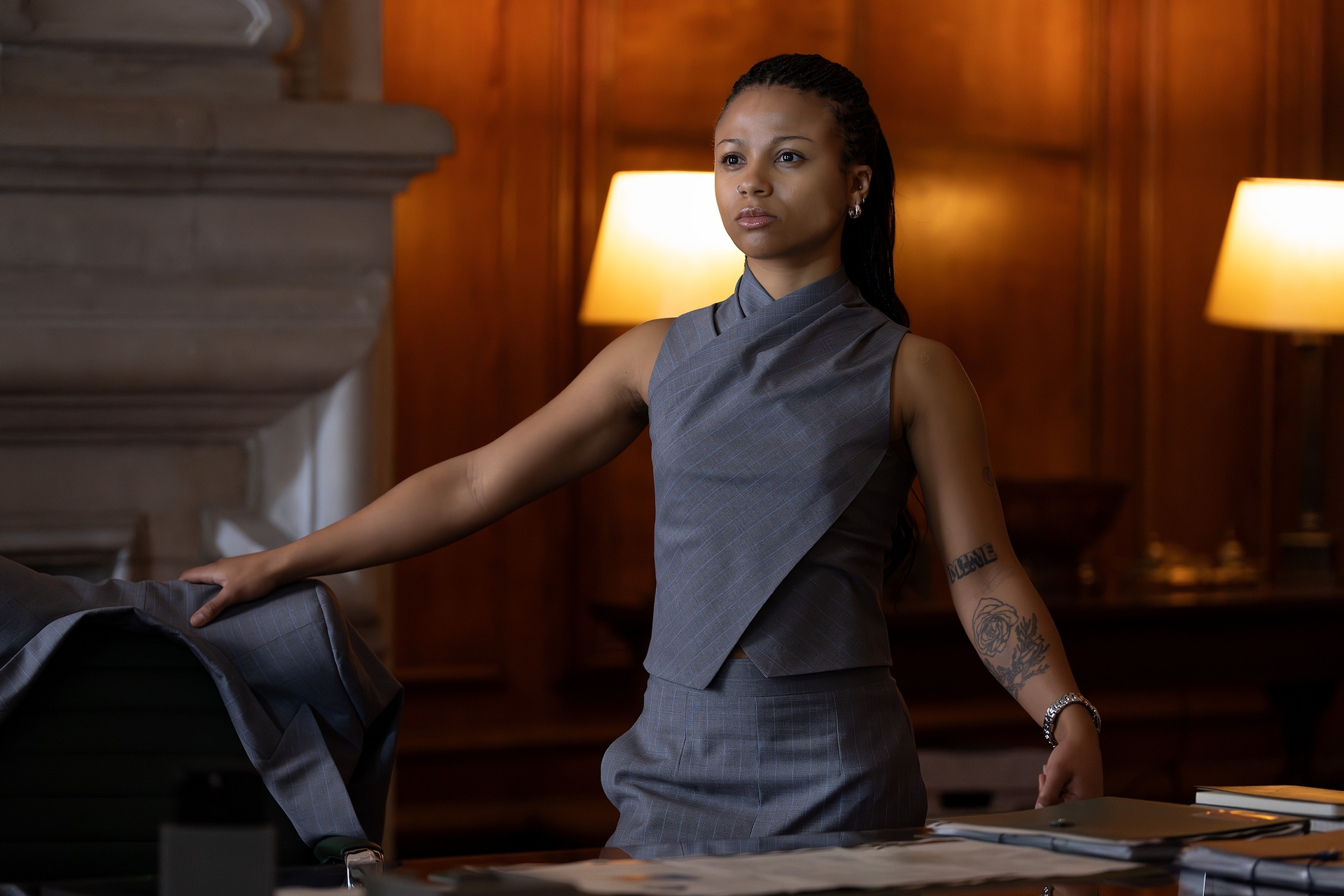 Industry Harper Stern played by Myha&amp;rsquo;la wearing a gray draped neck top