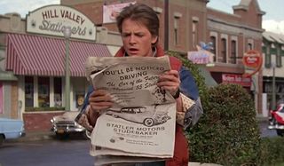 Back to the Future Marty stares at the paper in 1955