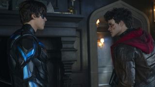 Scene from Gotham Knights where Nightwing and another character are having a standoff