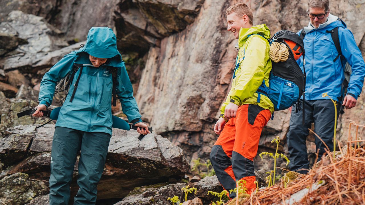 People wearing Arc&#039;teryx waterproofs in Lake District landscape