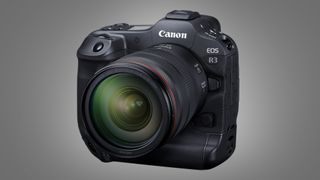 The Canon EOS R3 on a grey background