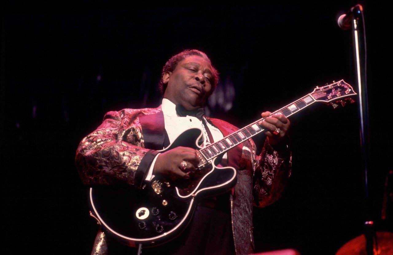 BB King playing guitar.