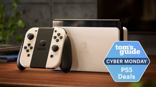 Nintendo Switch OLED on a table with a Tom's Guide Cyber Monday deal tag