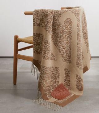 a beige patterned blanket