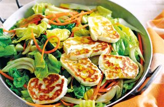 Spring vegetables and couscous with halloumi