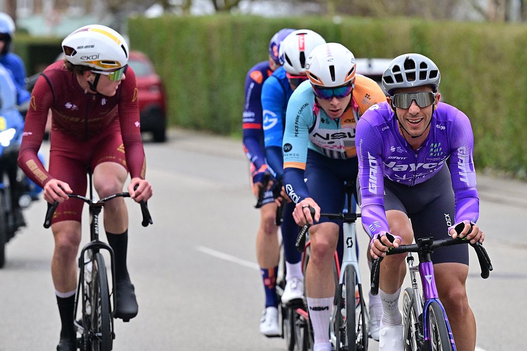 USA's Cole Kessler of Modern Adventure Pro Cycling, France's Matis Louvel of NSN Cycling Team and Belgium's Dries De Bondt of Team Jayco AlUla pictured in action during the 78th edition of the men elite race of the Kuurne-Brussels-Kuurne one day cycling race, 195 km from Kuurne to Kuurne via Brussels, Sunday 01 March 2026. BELGA PHOTO DIRK WAEM (Photo by DIRK WAEM / BELGA MAG / Belga via AFP)