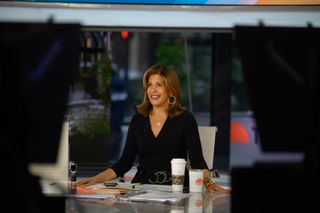 Behind the scenes image of Hoda at desk at NBS Studios