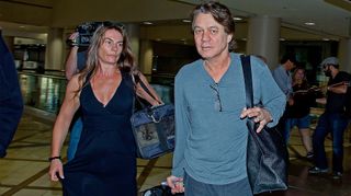 Eddie Van Halen and his wife Janie Liszewski are seen at Los Angeles International Airport on June 27, 2012 in Los Angeles, California.