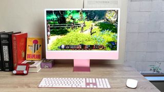 Apple iMac M4 review unit on desk running Baldur's Gate 3