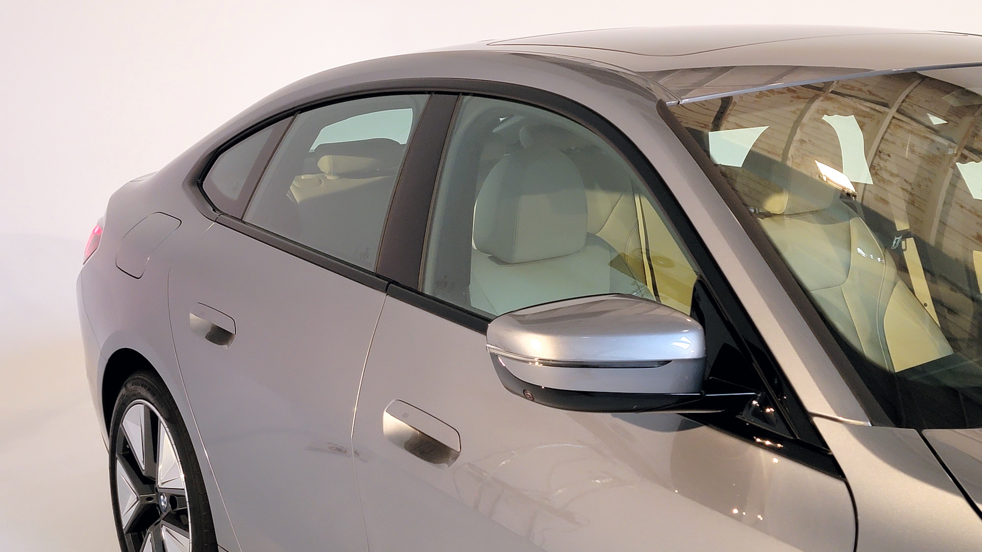 Close up of windows and wing mirror of a car