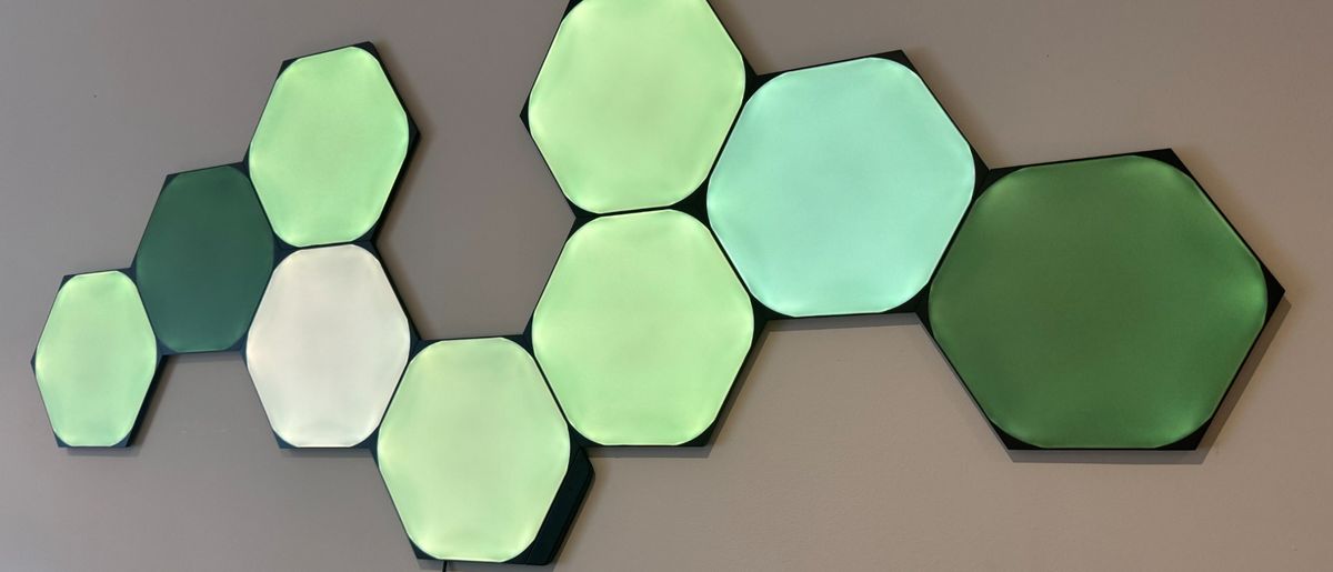 Nanoleaf Shapes Ultra Black turned on with green lights