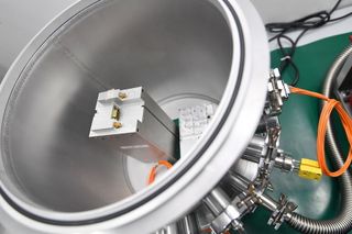 Addvalue's Inter-Satellite Data Relay System payload in vacuum chamber.