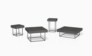 Set of four black square tables with steel tube legs
