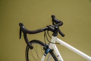 Detail of bars and stem fitted to a Ribble Endurance 725 steel road bike