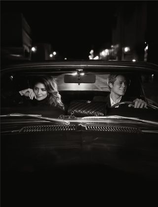 Penelope Cruz and Brad Pitti in car with Chanel bag