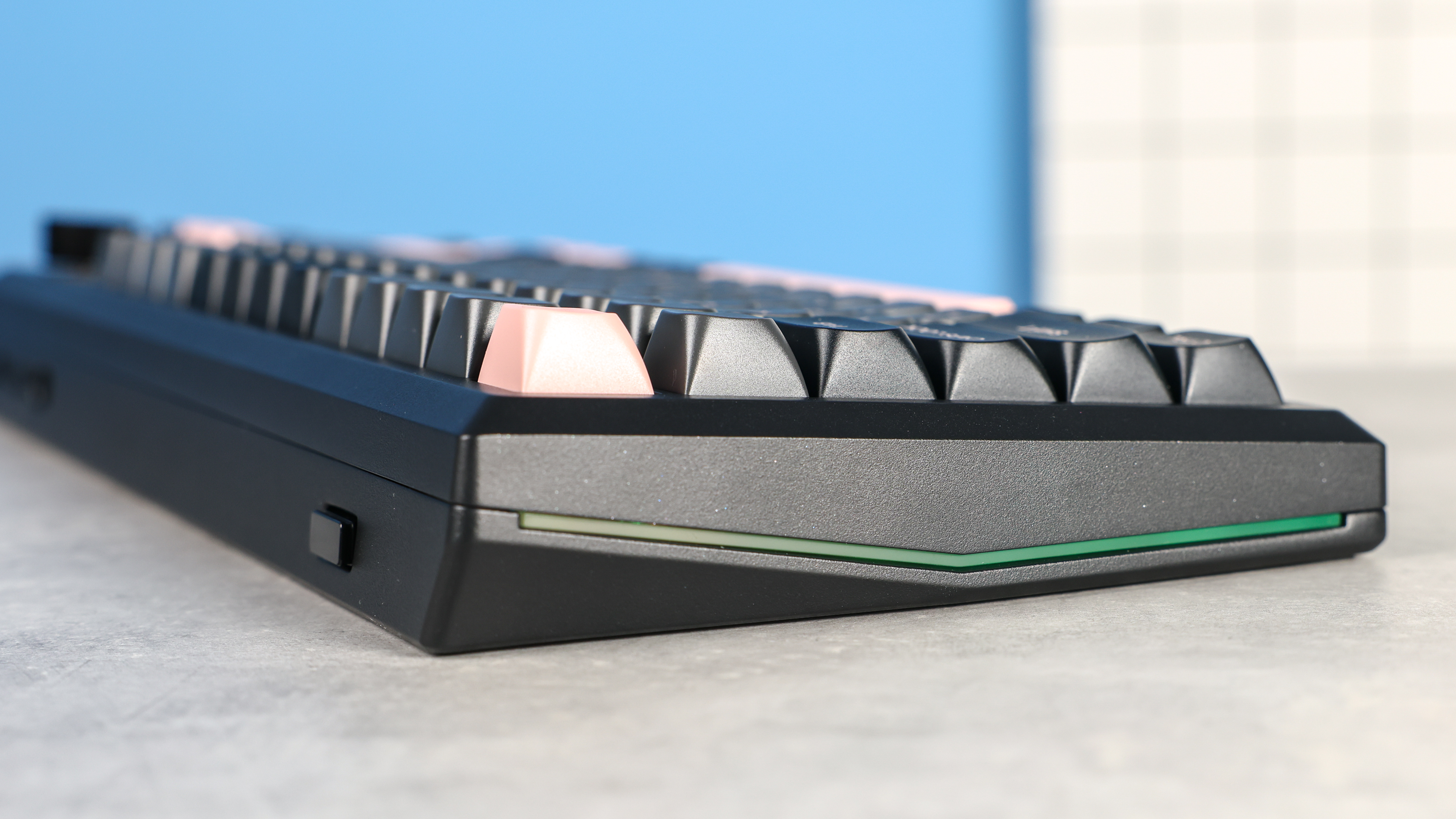 Redragon Eclipse K720 Pro photographed in front of a blue background.