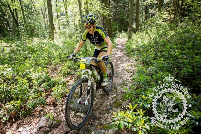 Sonya Looney makes her way over a rocky section with a smile.