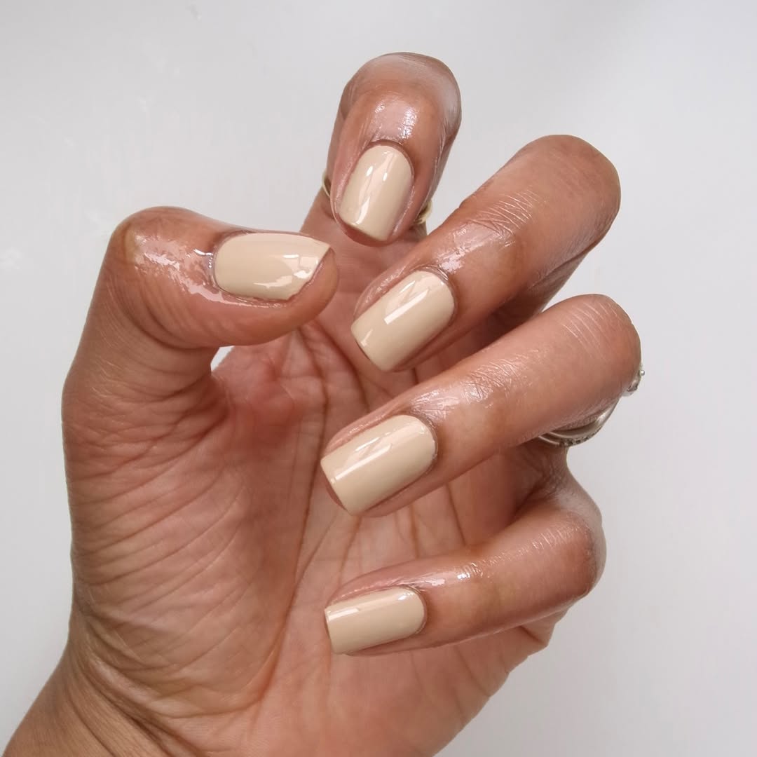 A soft beige engagement manicure.