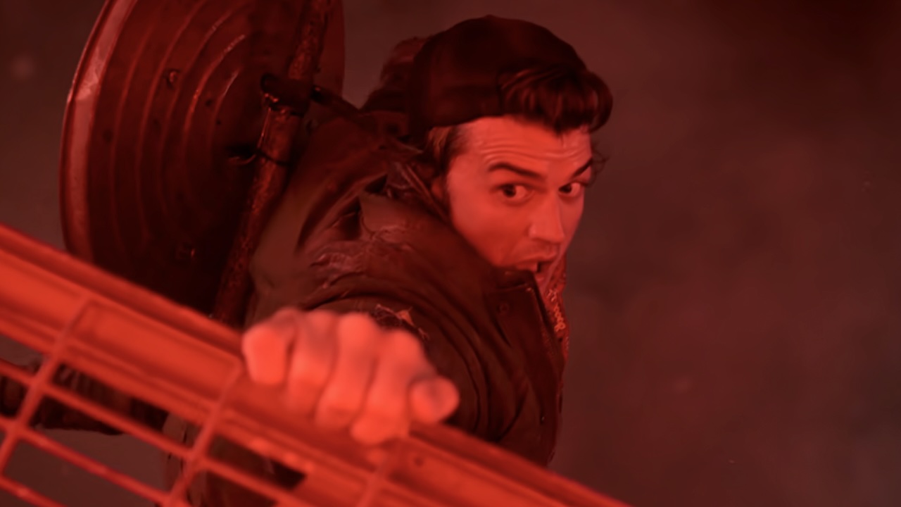 Steve hanging from edge of radio tower in Stranger Things Season 5 finale