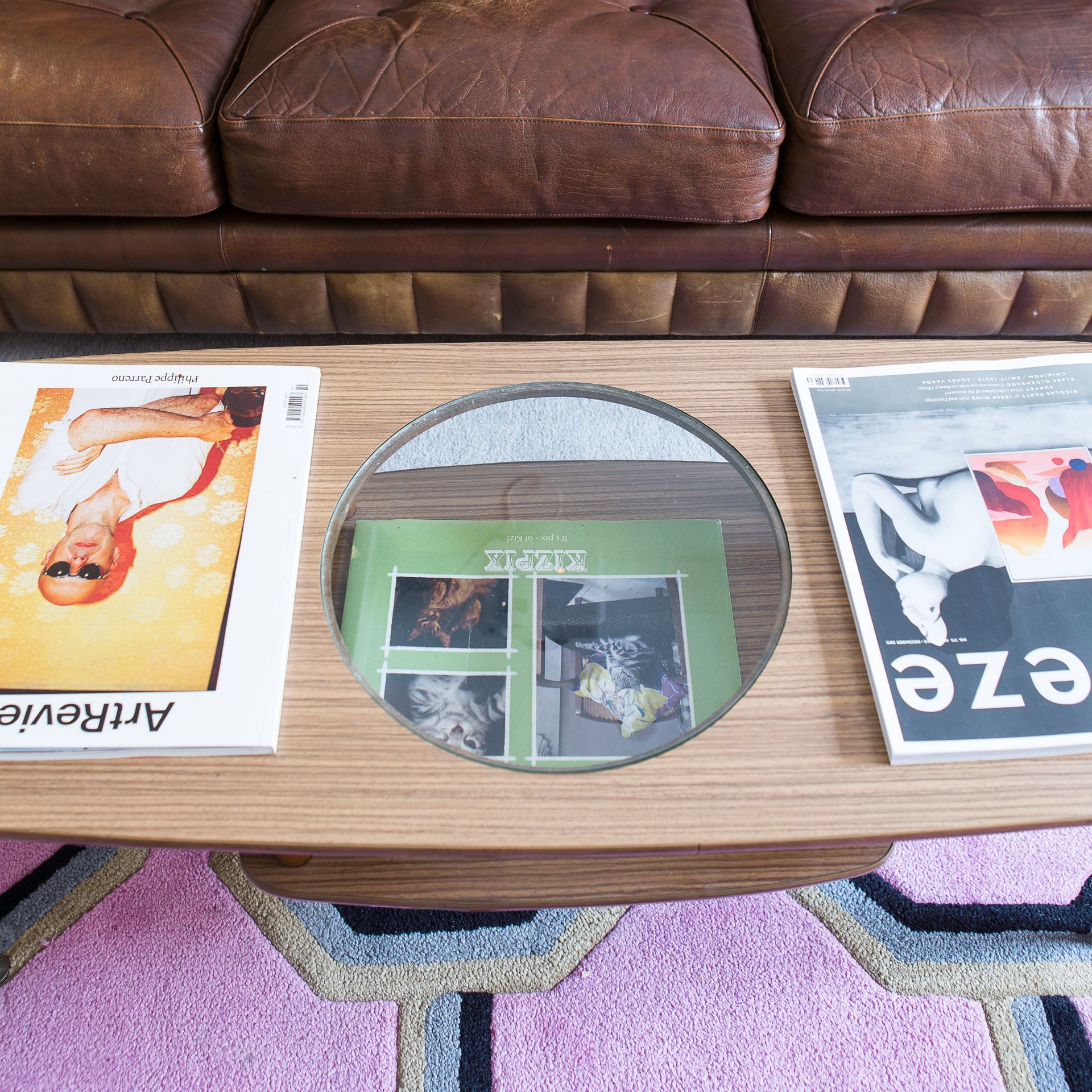 Vintage leather sofa closeup and coffee table