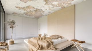 bedroom with ceiling wallpaper